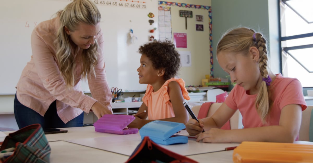 Teacher teaching a student